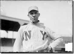 New_York_Giants_first_baseman_Dan_McGann,_standing_on_the_field_at_West_Side_Grounds
